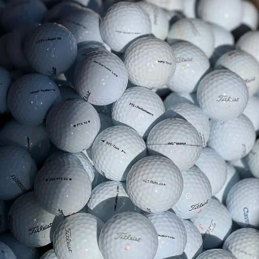 50 kappaleen käytettyjen Titleist golfpallojen lajitelma ekologisessa pakkauksessa – Järvigolf